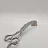 Silver ornate hair scissors on display