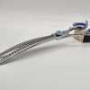 Decorative barber scissors with blue gemstone details