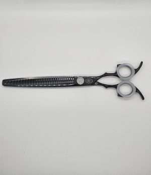 Black professional hair thinning scissors on white background.