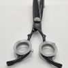 Professional hair thinning scissors with black handle.